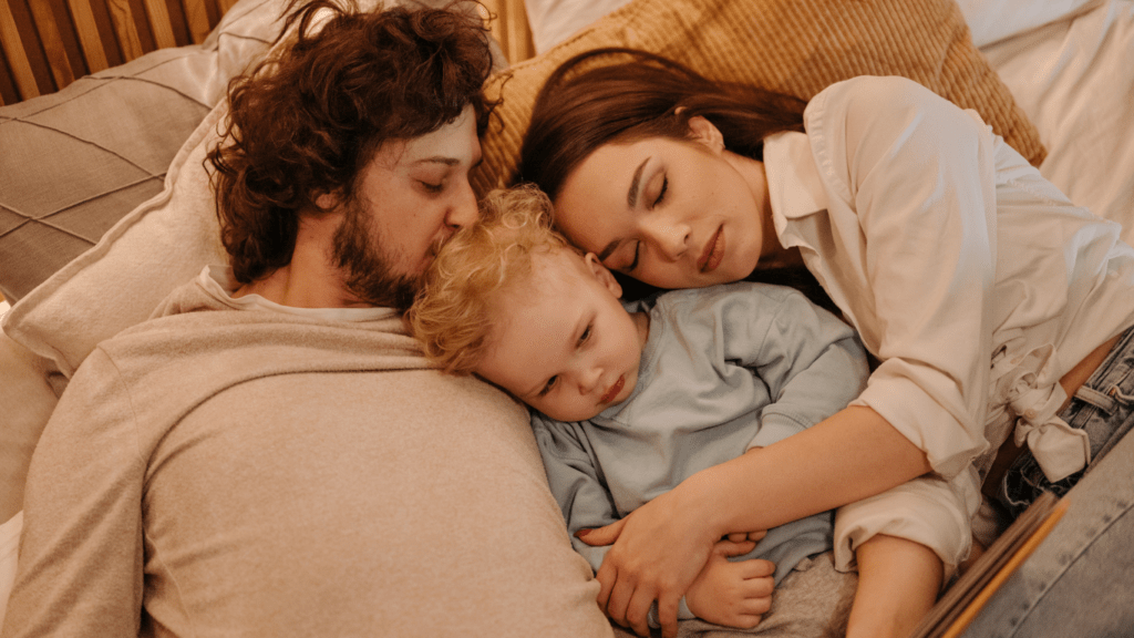 Family sleeping together 