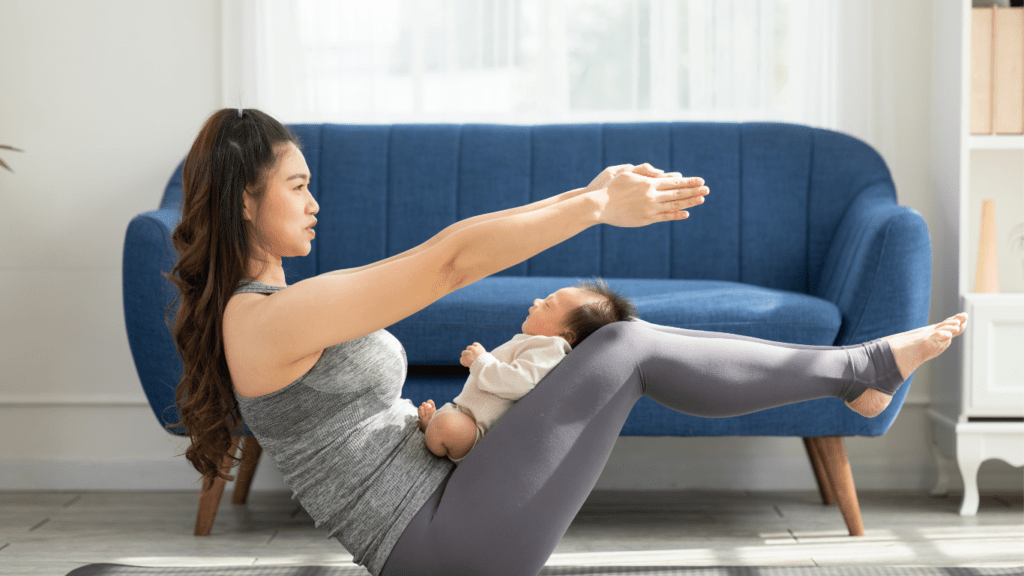 Mom doing Yoga with baby 