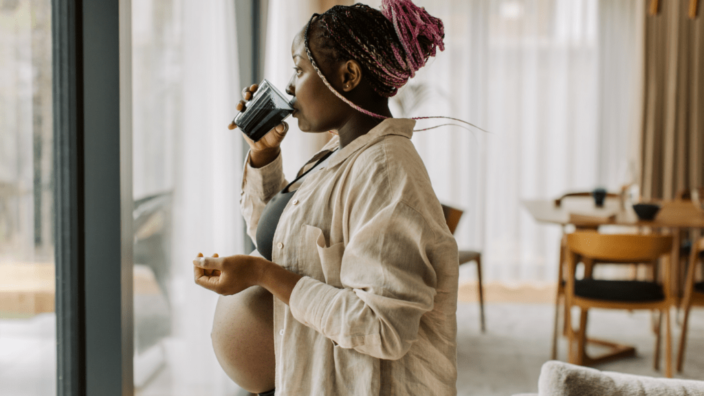 Pregnant woman drinking tea