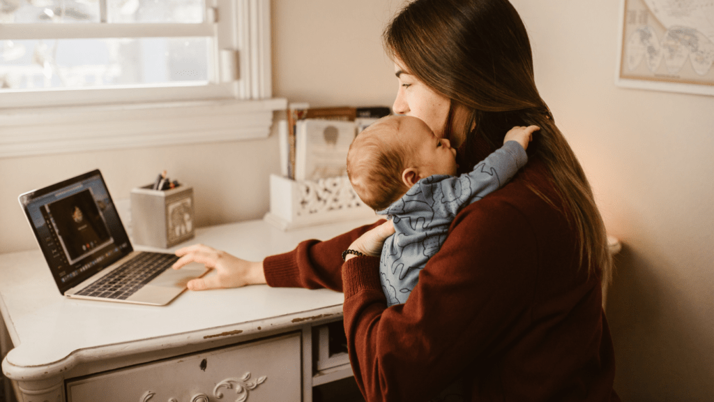 Mom with her Baby using Laptop