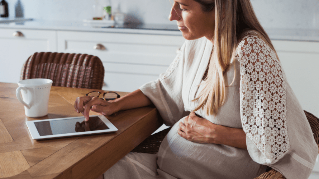 Pregnant woman doing online shopping 